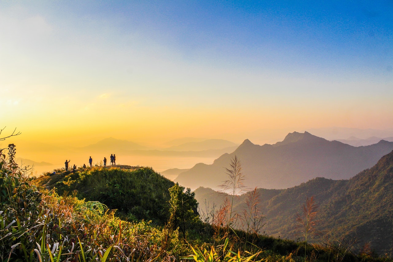 Get Involved Photo Of People Standing On Top Of Mountain Near Grasses 733162