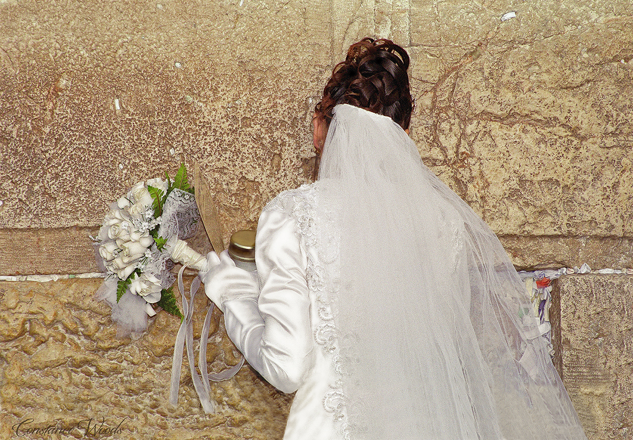 bride at the wall